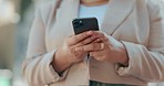 Closeup, business and woman with a smartphone, hands and typing with connection, social media or network. Female person, cellphone or mobile application with contact, search internet and website info