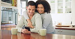 Couple, hug and reading phone together with coffee in morning conversation, quality time and funny joke in home or kitchen. Drinking, tea and people dating, talking and happiness in relationship