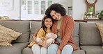 Home, mother and girl on a couch, toy and family with happiness, bonding and quality time. Face, mama and daughter on a sofa, child development and carefree with joy, mom and female kid in a lounge