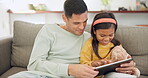 Tablet, dad and relax with girl on sofa in home living room for bonding, learning on app or having fun. Father, technology and happy child on couch, streaming movie or typing on social media together