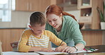 Family, education and a mother teaching her son over homework or to study while learning in the kitchen. Tutor, school and a happy boy student distance learning or home schooling with a parent