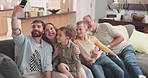 Selfie, love and happy big family on a sofa in the living room of their modern home together. Happiness, smile and children taking picture with their grandparents and parents in the lounge of a house