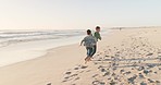 Playful, holiday and boys running, beach and happiness with sand, weekend fun and freedom with joy. Male people, children and kids with seaside vacation, laughing and run with health, happy and ocean