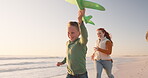 Family, smile and play with airplane at beach on vacation, summer travel and mockup sunset. Happy, parents and child running with toy at ocean, sea or enjoying freedom together with mother and father