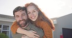 Portrait, happy couple hug with new house and real estate with smile on face, love and invest in future home. Man, woman and happiness in backyard together, property investment and marriage support.