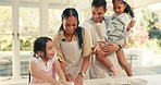 Happy, kitchen and family baking together for a dessert or sweet snack in their modern house. Happiness, love and children cooking dinner, supper or a meal with their young parents at their home.