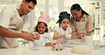 Baking, ingredients and parents teaching children about cooking in the kitchen of their home together. Pastry, kids or family with girl sisters learning about food from mom and dad in the house