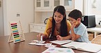 Education, teaching and mother with her child for homework in the dining room of their family housee. Knowledge, learning and young mom helping her boy kid with a mathematics school project at home.