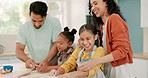 Bonding, kitchen and parents baking with their children for dinner, supper or dessert in their home. Happy, love and young mother and father cooking a meal with their girl kids in their family house.