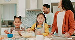 Laptop, problem solving and a family baking in the kitchen together with parents teaching their girl children about food. Computer, love or talking with kids learning how to cook from a mom and dad