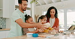 Laptop, dough and family baking in a kitchen together with parents teaching their girl children about food. Computer, recipe or ingredients with kids learning how to cook from a playful mom and dad