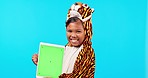 Little girl, tablet and mockup screen in costume for advertising against a blue studio background. Portrait of female child or kid smile with technology app, chromakey display and tracking markers