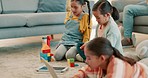 Family, happy and children play with toys for bonding, quality time or child development at home. Parents, siblings and kids learning with tablet, building blocks and relax in living room on playdate