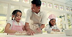 Baking, dough and a dad teaching his girls about cooking in the kitchen of their home together. Pastry, children or family with female kids learning about food from from a man parent in the house