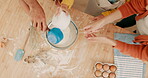 Top view, family and baking flour in kitchen, learning and having fun together while bonding. Cooking, food and parents with children, mother and father for education, teaching or prepare dough.