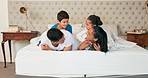 Happy family, mom and dad with children on bed, playing and bonding fun in home on weekend morning. Happiness, parents and kids joke in bedroom, playful quality time together and laughing with love.