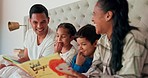 Mom, dad and happy kids in bedroom with reading book, teaching and fun learning in family home. Happiness, fantasy and parents relax on bed with laughing children, love and funny storytelling time.