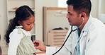 Medical, doctor and girl in a consultation, kid and pediatrician with a checkup, results and diagnosis. Male person, female child and healthcare professional with treatment, stethoscope and talking