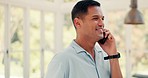 Laughing, conversation and a man on a phone call in a house for communication or funny chat. Happy, hello and a person speaking on a mobile for networking, discussion or talking to a contact in home