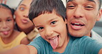 Family, selfie and funny face of children and parents together in a living room at home. face of a man, woman and young kids together for fun, happiness and picture while playing for bonding and care