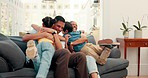 Family hug, excited and talking on the sofa with love, care and bonding in a house together. Happy, relax and young parents with affection for children and conversation on the living room couch