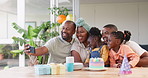 Selfie, birthday and black family of children and parent together for bonding, love and care. African woman, man and happy kids at home for a picture, quality time and bonding or fun at a party