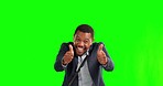 Thumbs up, business and happy black man on green screen for support, thank you and success. Excited, studio and portrait of male entrepreneur with approve hand gesture for promotion, bonus or winning