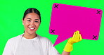 Asian woman, cleaner and speech bubble on green screen for chat against a studio background. Portrait of female person or maid with icon for FAQ, social media feedback or comment on mockup space