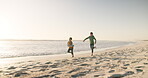 Beach, happy and children running for a race, fun competition or exercise together on holiday. Playful, fitness and kids at the sea for cardio, playing and crazy on a vacation in summer for fitness