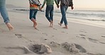 Travel, holding hands and closeup of people walking on the beach while on summer vacation. Love, adventure and zoom of family on the sand by the ocean or sea while on tropical holiday or weekend trip