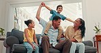 Family, together on sofa and children on dad shoulders for fun, bonding or quality time in living room with mom and girl. Couple, kids and laughing at funny game, balance or support in house