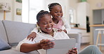 Family, woman with child and with tablet in living room of their home for social media. Technology or internet, streaming movie or bonding time and black mother with her daughter together happy