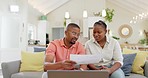 Finance, budget and couple with laptop on sofa with bills, paperwork and life insurance documents. Financial planning, mortgage and black man and woman on computer for pension, payment or investment