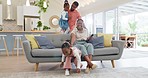 Happiness, playful parents and kids on sofa, black family having fun and smile in home together. Mother, father and young children playing on couch in living room, happy playing with love and support