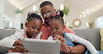 Family, man with children and with tablet in living room of their home for social media. Technology or internet, connectivity or bonding time and black man with his kids together streaming a movie