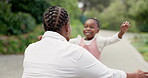 Black girl, hug and mother with love in park with happiness or bonding with kiss in nature for childhood. Affection, daughter and woman in forest with embrace for love or care with happy kid.