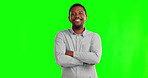 Black man, smile and arms crossed on green screen with confident, happy or positive mindset on studio background. Happiness, portrait and face of employee, worker or businessman with success