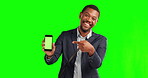 Advertising, portrait of a businessman point at smartphone and against a green screen. Marketing or promotion, mock up space or display and happy black man with cellphone for product placement