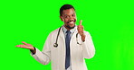 Black man, doctor and thumbs up on green screen for advertising or marketing against a studio background. Portrait of African male person with positive or negative emoji for yes or no on mockup space
