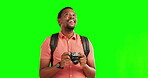 Green screen, camera and black man doing travel pictures to explore on a holiday or vacation happy and excited. Adventure, photography and young person or photographer with a discovery on a journey