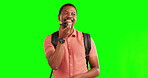 Green screen, phone and black man doing a voice message on online, internet or on social media talking to a contact. Happy, backpack and casual young person speaking or networking with smartphone