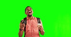 Green screen, phone and black man excited with notification, news or announcement of winning, deal or promotion. Happy, celebration and winner of surprise, bonus or awards on studio background