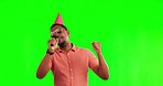 Microphone, dance and man in a studio with green screen singing karaoke with party hat. Happy, celebration and African male person dancing to music, song or playlist isolated by chroma key background