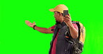 Hiking, black man and phone for video call on green screen with network connection, contact and communication for travel. Vlog, influencer or person talking with a mobile and backpack on background 