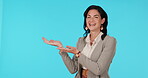 Portrait, business woman and hands to show choice or opportunity in studio mockup of placement in background. Advertisement, smile on face and promotion of option or announcement of offer in hand