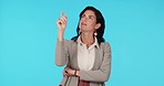 Corporate thinking, pointing and planning woman gesture at development option, promotion ideas or comparison mockup. Service, decision and studio person question commercial choice on blue background