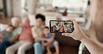 Phone screen, hands and home family bond, pose and memory photo of weekend reunion, love and care picture. Photography, smartphone or relax grandparents, parents and children together for online post