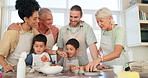 Parents, grandparents and children with a family baking in the kitchen of their home together during a visit. Love, learning and kids in a house with their relatives for domestic cooking education