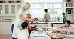 Home food, serving chicken or happy family lunch, eating meal or sharing at Thanksgiving buffet. Grandmother, sitting kids and senior man, woman or people bond, hungry and enjoy turkey meat together 
