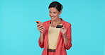Woman, credit card and smartphone, online shopping and fintech, happy with bank app and payment on blue background. Female customer, positive ecommerce experience and internet banking with finance